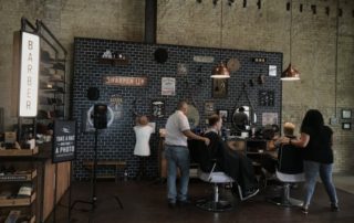 A pop up barber shop inside the Jack Daniel's Lynchburg General Pop Up with Mirrorball and Fuller Street