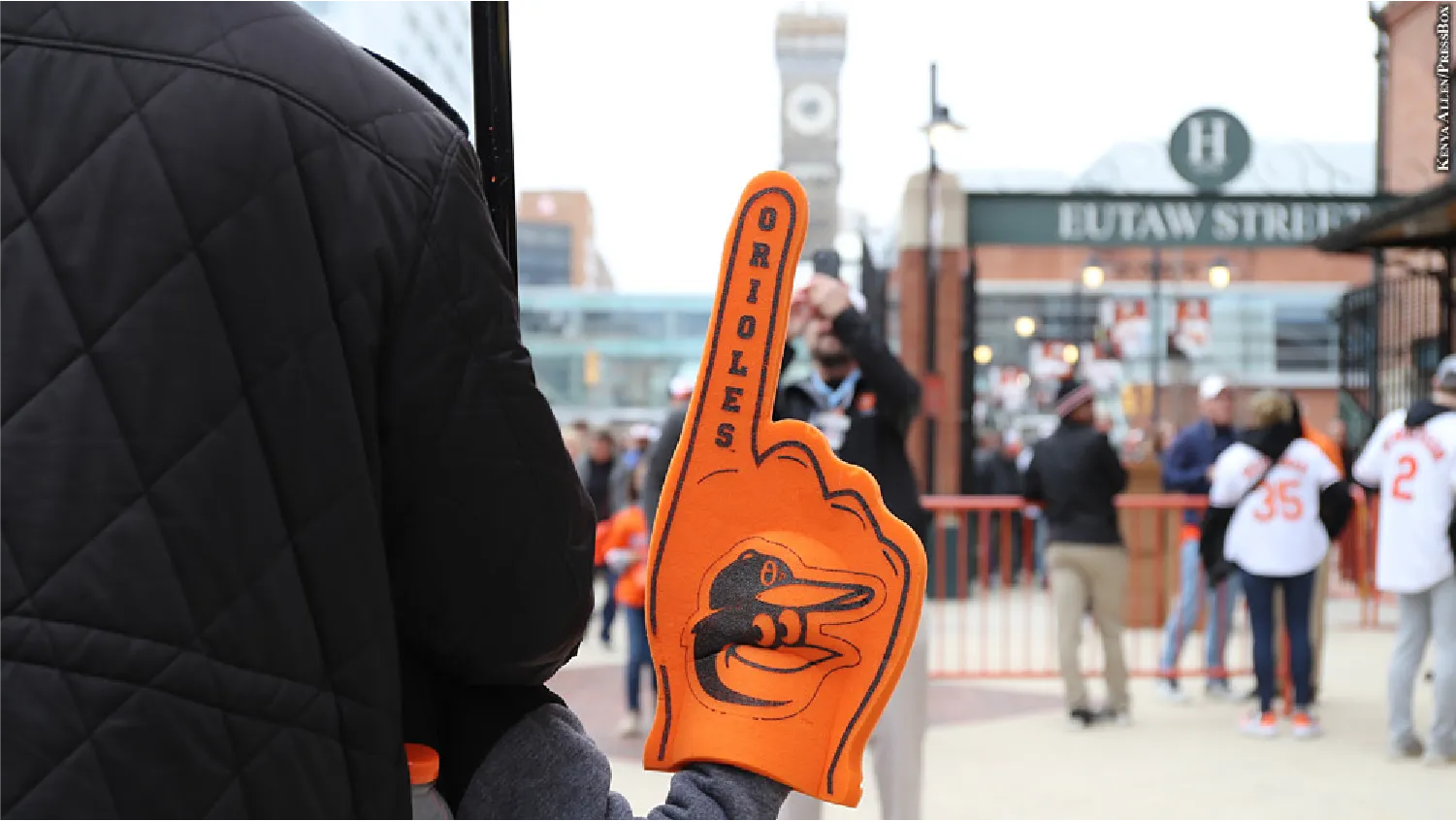 Young Fan waves Number 1 Foam Finger on Eutaw Street at Camden Yards with upgraded Home Run Porch and Under Armour Cleat