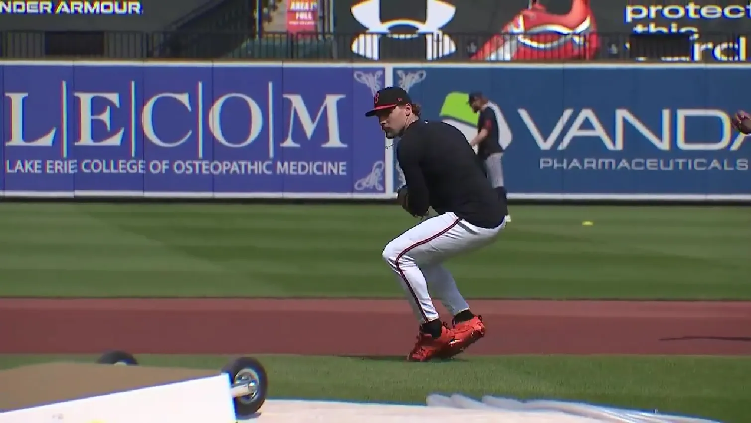 Gunnar Henderson relays a ground ball with Under Armour Cleat on Home Run porch in the background