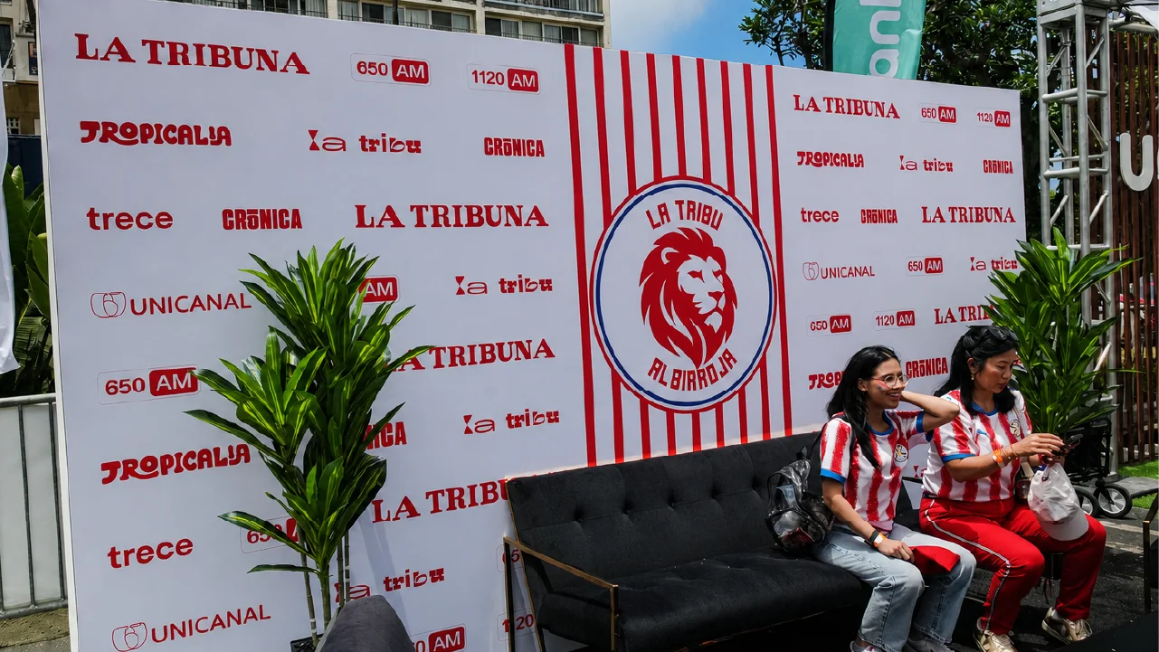 Fans seated at the photo op provided by Fuller Street for the Casa Albirroja Fan Experience in Santa Clara