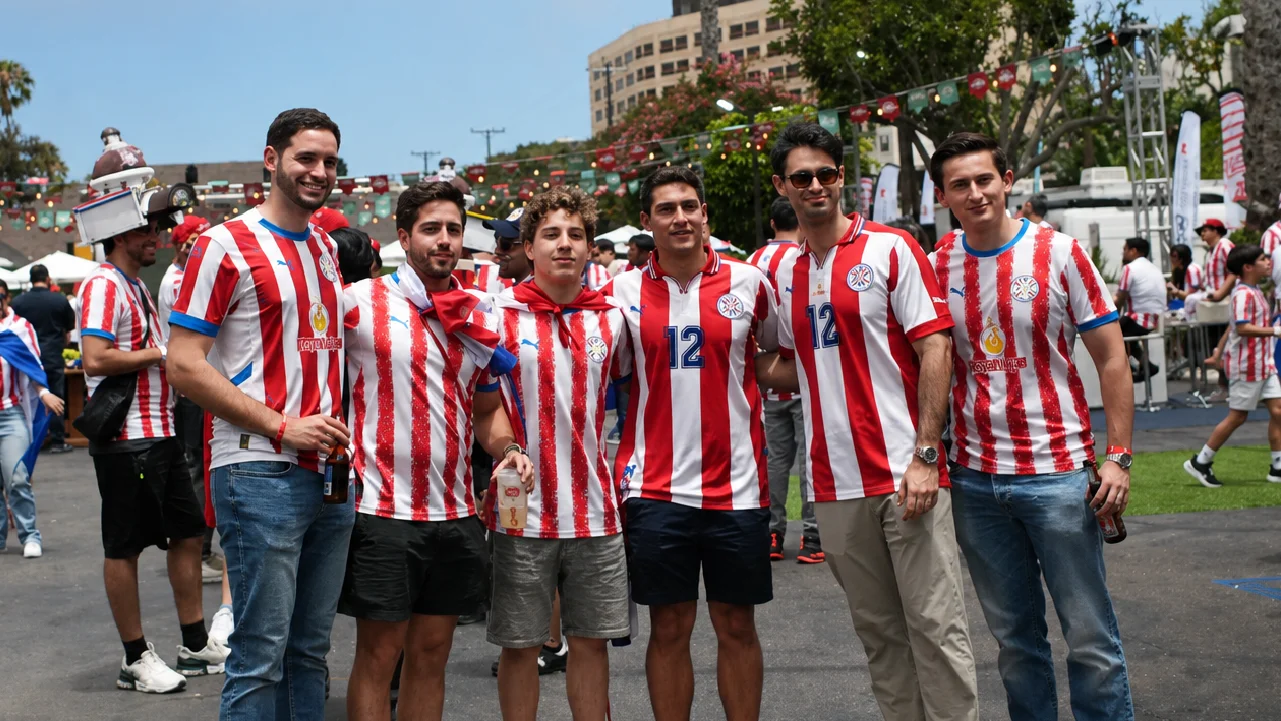 casa-albirroja-paraguay-world-cup-fans Paraguay World Cup fans take a photo together at the Casa Albirroja Fan Experience in Los Angeles